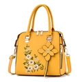 Borsa a mano giallo zenzero con ricamo floreale e tracolla rimovibile vista variante - Giallo