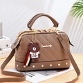 Brown quilted crossbody handbag with rhinestone trim and cute bear keychain accessory - Khaki
