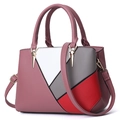 Chic geometric patchwork tote bag in pink, white, and grey with gold accents and strap - Pink