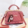 Deep pink quilted rhombic handbag with leather grain finish and a cute bear charm - Dusty Pink