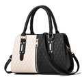 Elegante borsa bicolore bianca e nera con trama a rombi e finiture dorate - Nero