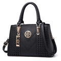 Fashionable black pebbled leather handbag with gold hardware and embroidery accents - Black