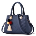 Dark blue pebble leather handbag for women with V-stitch design and colorful pompom - Dark Blue