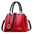 Sac seau chic en cuir rouge avec poignées noires et logo Gensandy doré détaillé - Bordeaux