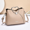 Elegante bolso de mano beige con asa metálica de corazón y correa ajustable multifuncional - Caqui