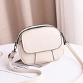 Petit sac bandoulière rond blanc crème avec texture litchi et double fermeture éclair - Blanc