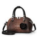 Brown crocodile embossed shell handbag with black handles and rose pendant charm - Coffee