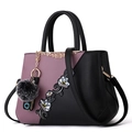 Elegant purple and black leather handbag with floral embroidery and gray pompom charm - Steel Bar Style / Purple