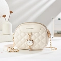 Creamy white quilted crossbody bag with a cute cat charm and gold chain strap - White