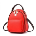 Mini backpack in bright red lychee textured PU leather with dark brown contrast straps - Red