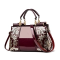 Deep burgundy patent leather handbag featuring elegant light gold floral sequin embroidery - Double-sided Embroidery / Fuschia