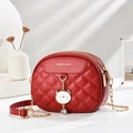 Red quilted crossbody bag with a cute cat charm and triple zipper compartments - Burgundy