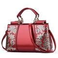 Glossy red patent leather handbag with silver sequin floral embroidery and gold hardware - Shiny Regular / Burgundy