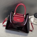 Elegant burgundy snakeskin textured leather handbag with golden hardware for professional women - Burgundy