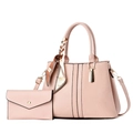 Detail of pink tote bag with woven texture, matching envelope wallet, and silk scarf wrap - Pink