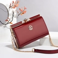 Elegant deep red patent leather handbag with gold W logo and chain strap for women - Glossy Wine Red