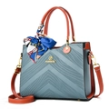 Blue and orange color-block tote bag with V-shaped texture and decorative silk scarf - Blue
