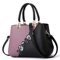 Borsa bicolore viola e nera con ricamo floreale e dettagli in metallo dorato lucido - Classico / Viola
