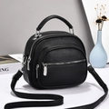 Bolso de mano retro de cuero negro con herrajes plateados y correa ajustable - Negro
