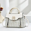 Elegant white tweed crossbody bag with gold flamingo clasp and pearl tassel detail - Off White