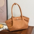 Caramel brown suede tote bag with pleated sides and elegant metal buckle detail - Earthy Yellow