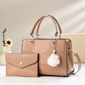 Detail of crocodile pattern faux leather tote bag with heart charm and plush ball accessory - Khaki
