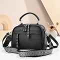 Minimalist black lychee texture handbag with wide herringbone strap and silver rivets - Black