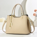 Elegant beige lychee texture handbag with gold metal accents and pearl tassel detail - Light Khaki