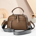 Dark brown textured leather crossbody bag with silver rivets and dual strap options - Coffee