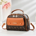 Retro brown monogram crossbody bag with caramel trim and gold logo hardware - Coffee and Yellow