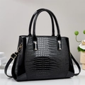Large black crossbody bag with crocodile pattern leather and golden hardware - Black