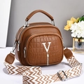 Brown leather handbag with croc-patterned pocket and wide patterned shoulder strap - Earthy Yellow