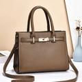 Deep khaki lychee grain leather handbag with gold twist lock and a crossbody strap - Lychee Texture / Khaki
