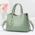 Sage green soft leather tote bag for women with golden heart pendant and pearl detail - Green