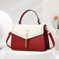 Retro red and white color-block women's handbag with gold cat-shaped lock and tassel detail - 23*8*16CM / Burgundy