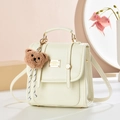 Minimalist cream shoulder bag in faux leather with gold buckle and brown teddy charm - Solid Color / White