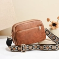 Brown faux leather crossbody bag with three zipper layers and bohemian patterned strap - Brown