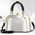 Close-up of a two-tone crocodile textured shell bag with gold hardware and top handles - 25*11*17CM / Gradient Grey