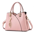 Pink lychee texture leather handbag with gold leaf pearl pendant and crossbody strap - Pink