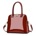 Glossy burgundy patent leather shell bag with gold hardware and dual handles - Red