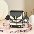 Mini plaid crossbody bag with wide strap, black bear charm, and golden twist lock - Plaid/White
