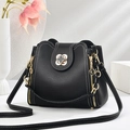 Chic black lychee leather bucket bag with white contrast stitching and clover twist lock - 22*10*20CM / Clover - Black