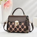 Borsa a tracolla vintage marrone con stampa geometrica e chiusura a girello oro - Monogramma Caffè