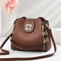 Brown leather bucket bag with gold clover clasp and adjustable long shoulder strap - 22*10*20CM / Geometric Brown