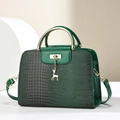 Dark green crocodile texture handbag with gold hardware and deer charm on white podium - 26*11*18CM / Green