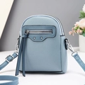 Light blue pebbled leather crossbody bag with dual zipper and silver stud detail - Vertical / Blue