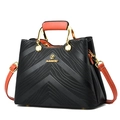 Bolso de mujer en bloque de color negro y coral con relieve en V y herrajes dorados - Negro