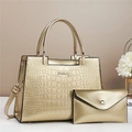 Luxurious gold crocodile-pattern tote bag set with matching envelope clutch and top handle - Gold