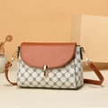 Retro kleine vierkante crossbodytas met bruine lederen flap en beige bloemenprint - Witte Sterren Stijl