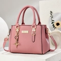 Pink lychee-textured leather handbag with golden star pendant and adjustable strap - Star Style/Light Pink